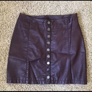 Free people - vegan leather buttoned skirt.